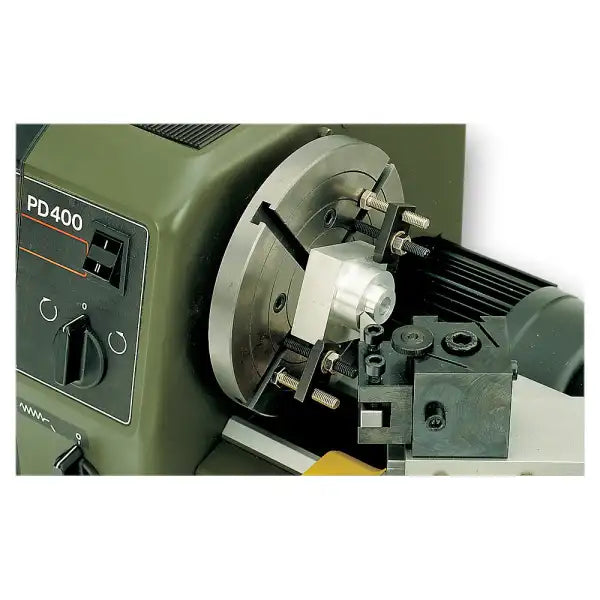 Proxxon Face Plate And Clamp Downs Pd 400 150Mm - A 125mm faceplate that fits in place of the standard chuck on lathe,