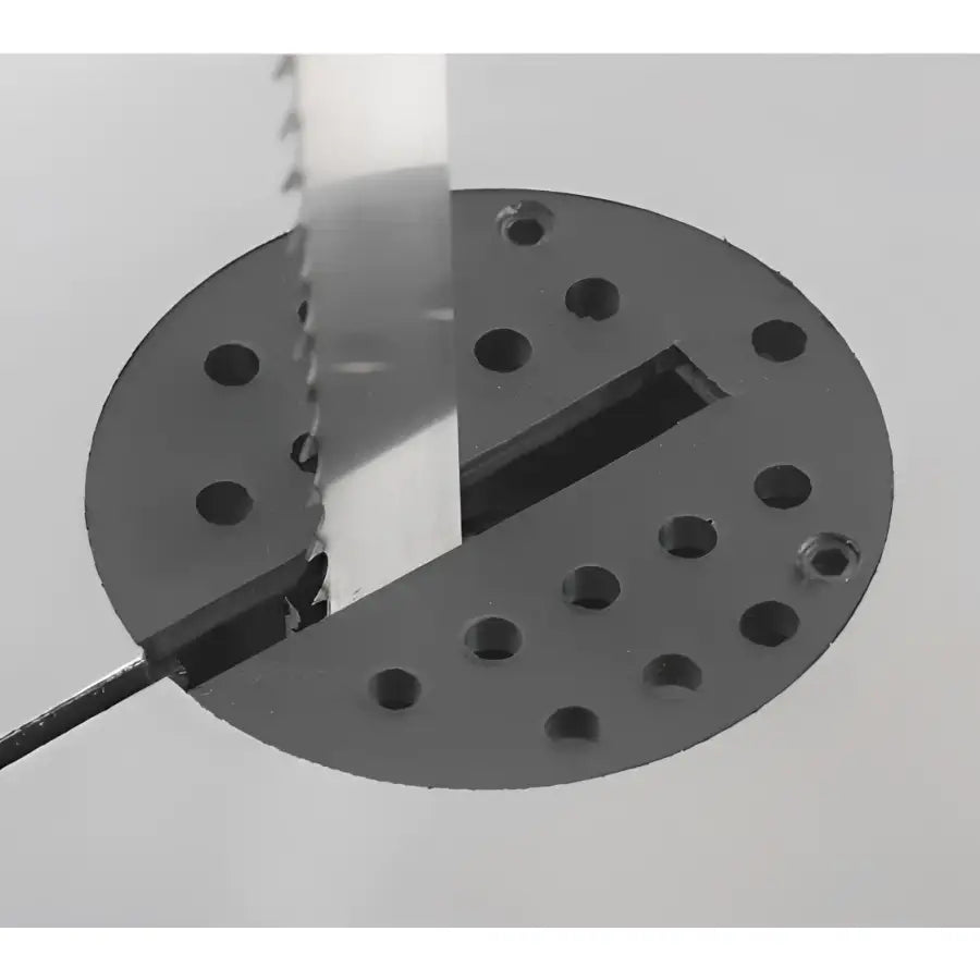 Adjustable Table Insert  The table features two essential levelling screws to raise or lower the table insert for a smooth feed over the cast iron table.